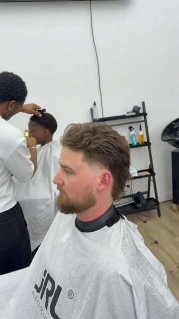 Mid-cut in the chair at GD Barber Lounge